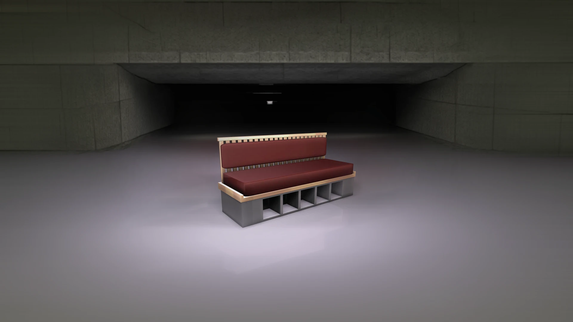 A bench with a burgundy fabric seat and back cushion on a gray base with open square compartments, in a dim concrete hall